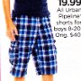 Ads for Shorts  Ad for blue plaid shorts with light charcoal low cut chucks.