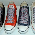 Star Print Shoelaces on Chucks  Core low top chucks with red and silver star print shoelaces.