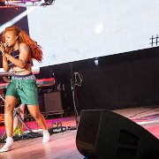 SZA  SZA performs in a pair of optical white high top chucks.