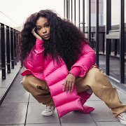 SZA  SZA in print pattern chucks on "whole nother level of cool."