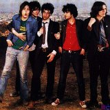 The Strokes  Posed casual shot. Fabrizio  Moretti stands out in his red high top chucks.