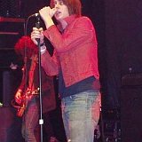The Strokes  Band in performance. Julian Casablancas sings in his red high top chucks.
