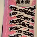 Tribal Band Shoelaces on Chucks  Tribal band print shoelace on a pink low top chuck.