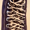 Tribal Band Shoelaces on Chucks  Tribal band print shoelace on a purple high top chuck.