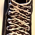 Tribal Band Shoelaces on Chucks  Tribal band print shoelace on a black high top chuck.