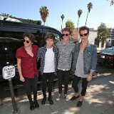 The Vamps  The band outside a restuarant.