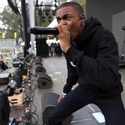 Vince Staples  Vince rocks green chucks while going in hard on a song.