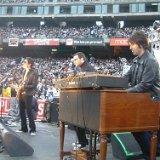 The Wallflowers  Performing at a stadium.
