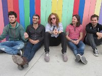 We The Kings  Posed shot of the band and Charles Trippy wearing black low top chucks.