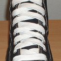 Fat (Wide) White Shoelaces on Chucks  Black high top with wide white laces.
