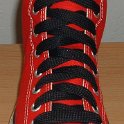 Fat (Wide) Black Shoelaces on Chucks  Red high top with wide black laces.