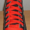 Fat (Wide) Red Shoelaces on Chucks  Black high top with wide red laces.