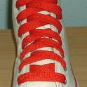Fat (Wide) Red Shoelaces on Chucks  Natural white high top with wide red laces.