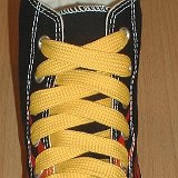 Fat (Wide) Gold Shoelaces on Chucks  Black flames high top with fat gold shoelaces.