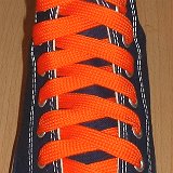 Fat (Wide) Orange Shoelaces on Chucks  Navy blue high top with fat orange laces.