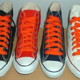 Fat (Wide) Orange Shoelaces on Chucks  Core color high top chucks with fat orange laces.