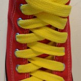 Fat (Wide) Yellow Shoelaces on Chucks  Red high top with yellow wide shoelaces.