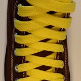 Fat (Wide) Yellow Shoelaces on Chucks  Chocolate brown high top with yellow wide shoelaces.