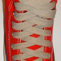Fat (Wide) Tan Shoelaces on Chucks  Red high top with fat tan shoelaces.