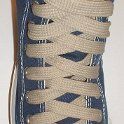 Fat (Wide) Tan Shoelaces on Chucks  Navy blue high top with fat tan shoelaces.