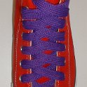 Fat (Wide) Purple Shoelaces on Chucks  Red high top with fat purple shoelaces.