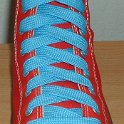 Fat (Wide) Sky Blue Shoelaces on Chucks  Red high top with fat sky blue shoelaces.