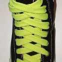 Fat (Wide) Neon Yellow Shoelaces on Chucks  Black high top chuck with fat neon yellow shoelaces.