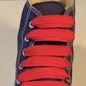 Extra Fat Shoelaces on High Top Chucks  Navy blue high top with red extra fat shoelaces.