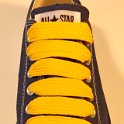 Extra Fat Laces on Low Top Chucks  Navy blue low top chuck with golden yellow extra fat shoelaces.