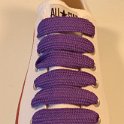 Extra Fat Laces on Low Top Chucks  Optical white low top chuck with purple extra fat shoelaces.