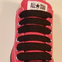 Extra Fat Laces on Low Top Chucks  Red low top chuck with black extra fat shoelaces.