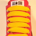 Extra Fat Laces on Low Top Chucks  Red low top chuck with golden yellow extra fat shoelaces.