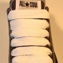 Extra Fat Laces on Low Top Chucks  Charcoal grey low top chuck with white extra fat shoelaces.